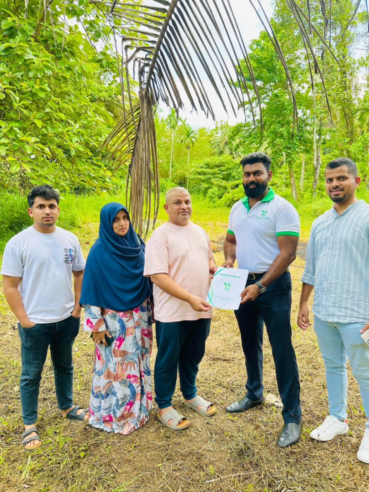 Family agreement signing for new plantation project